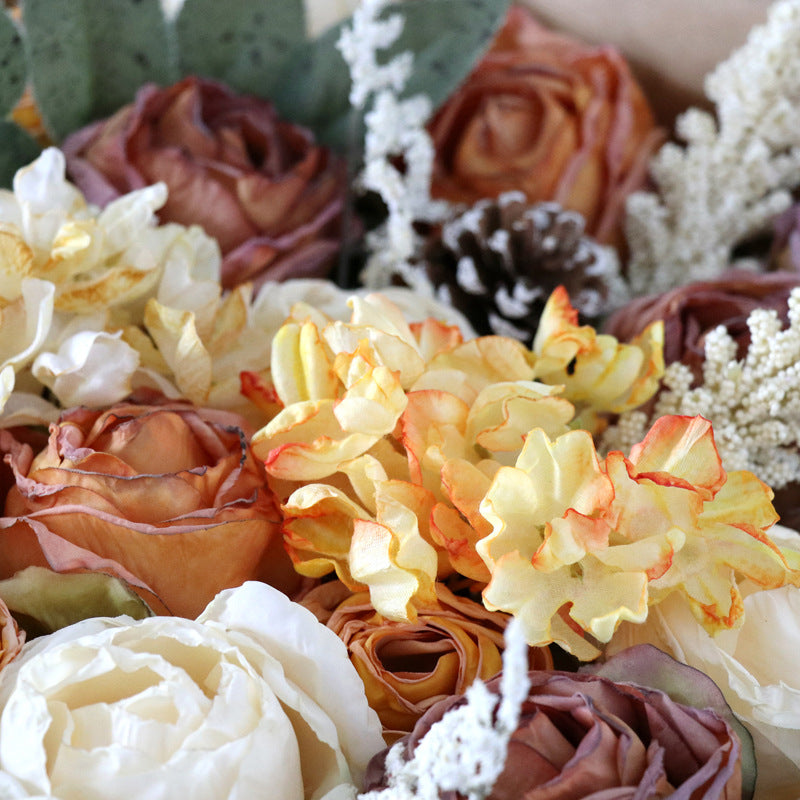 Boîte à fleurs de mariage roses orange et champagne